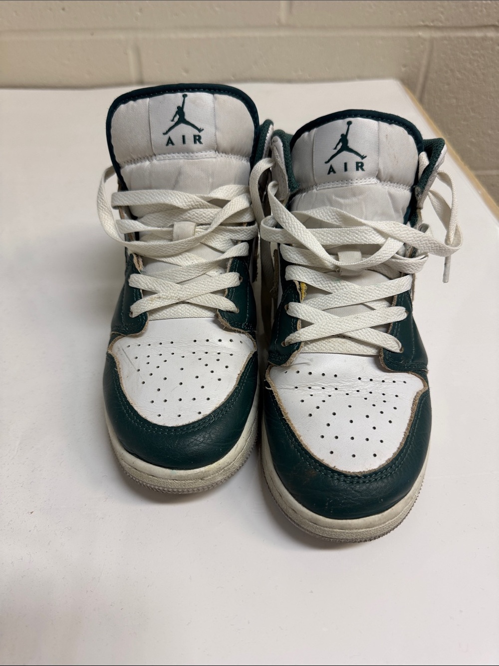Youth Jordan High Top Sneakers